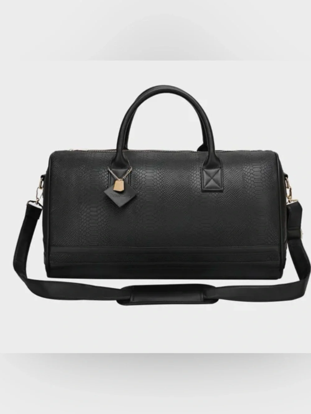 Tote & carry the Signature Weekender Duffle Bag. 19.5x23 vegan leather. (Bags19)